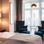 Brassel Aparthotel 4*